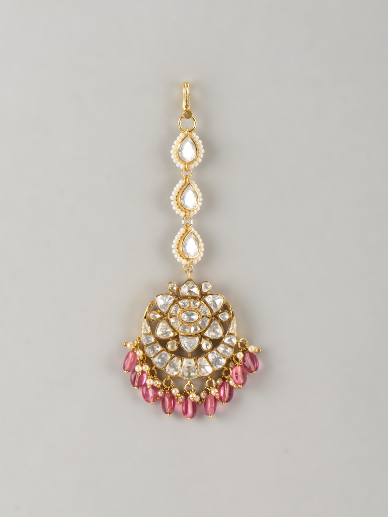 Lara Maang tika with red beads